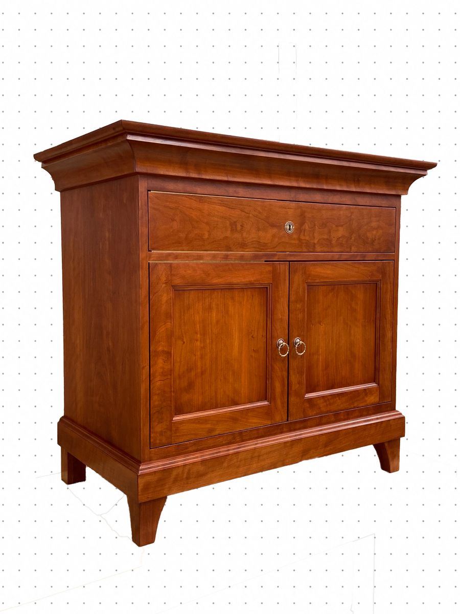 Cherry cabinet with a paneled door and hand-fitted drawer
